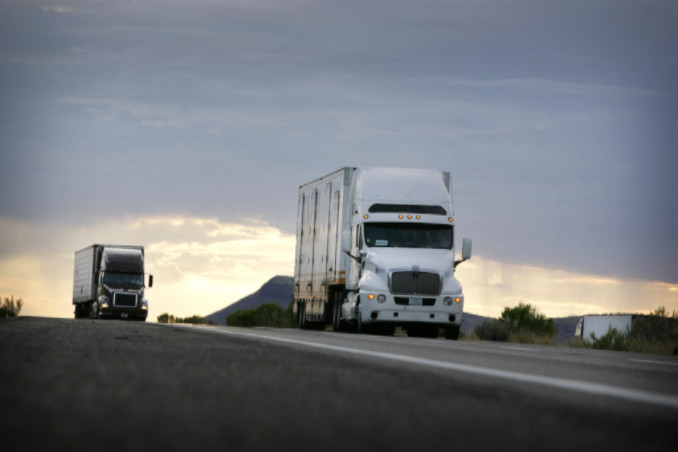 Large truck on highway at sunset: RedLawList Accidents & Injuries Blog