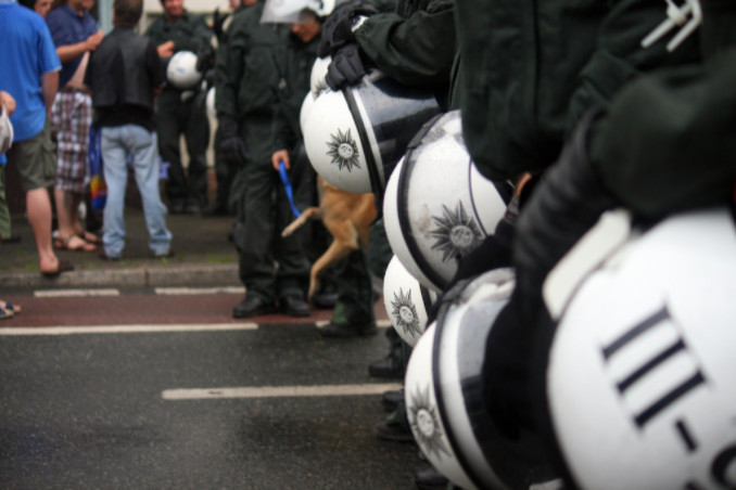 police officers in line: RedLawList Criminal Law Blog