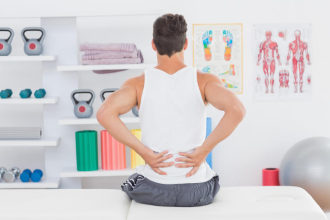 Man with back pain; Red Law List Accident & Injuries Blog